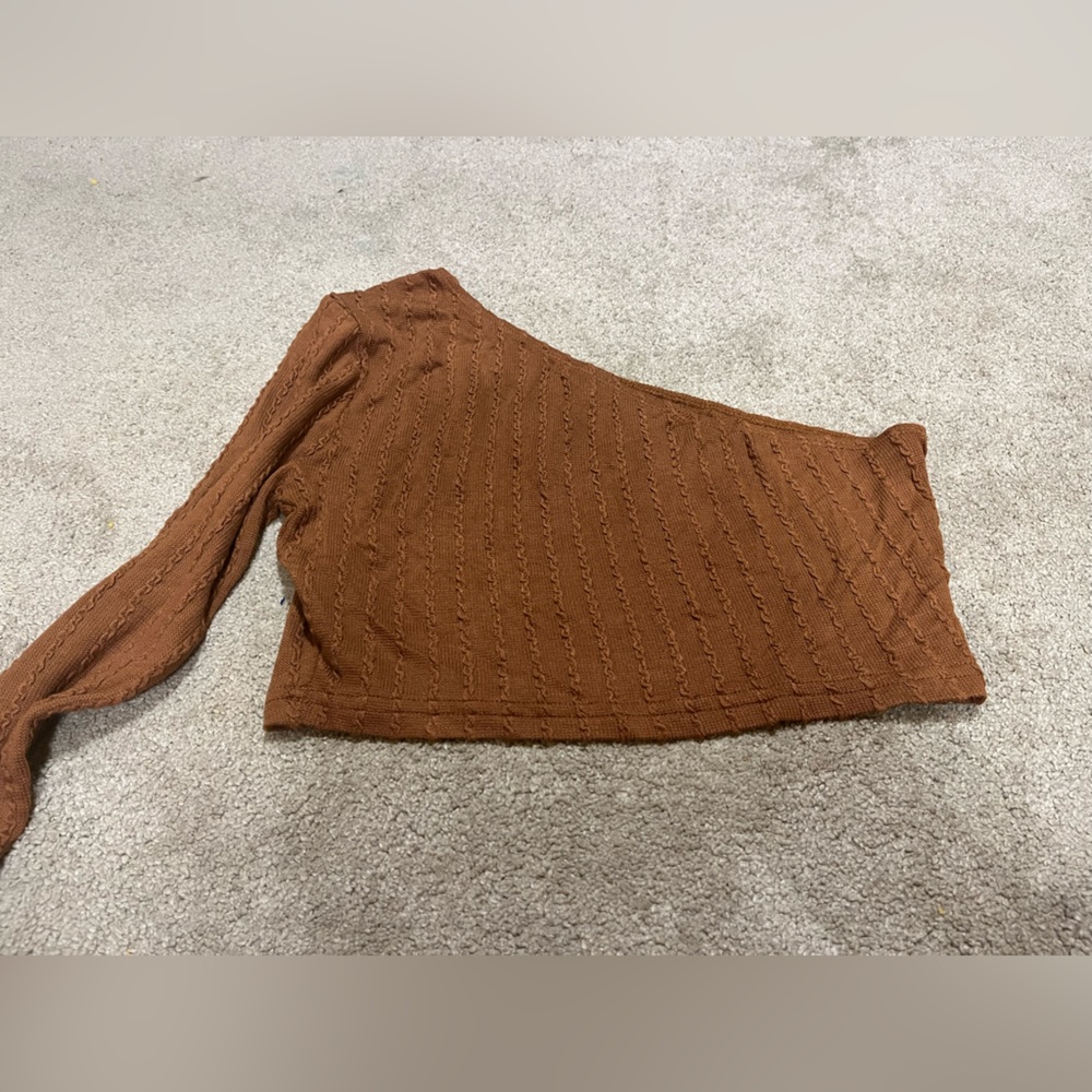Very cropped one sleeve shirt, never worn